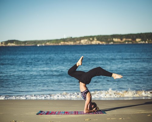 Person doing yoga outdoors in nature